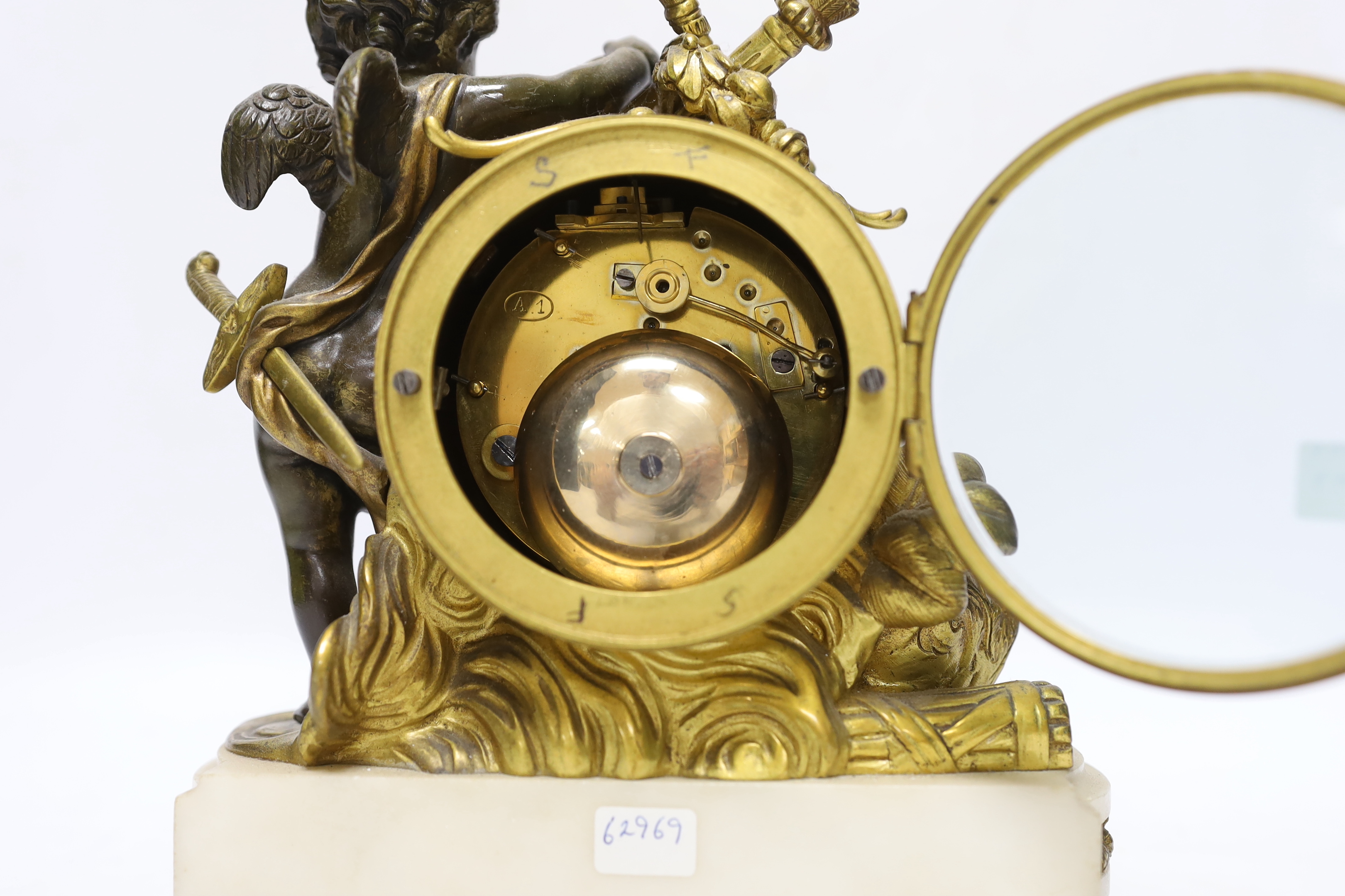 A French ormolu and bronze mantel clock striking on a bell, 22cm high